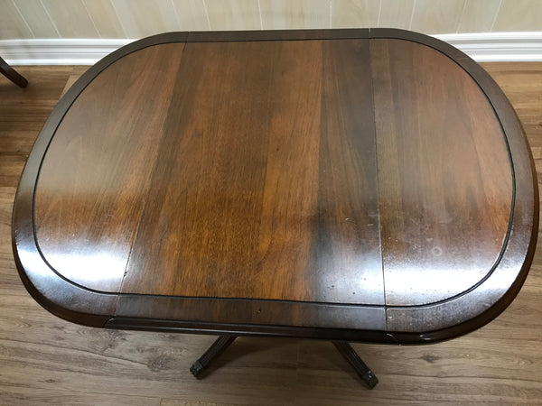 Solid wood folding side table.