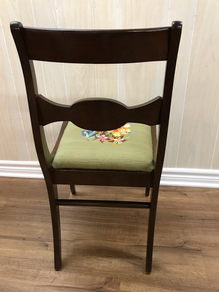 Solid wood chair with needlepoint cushioned seating